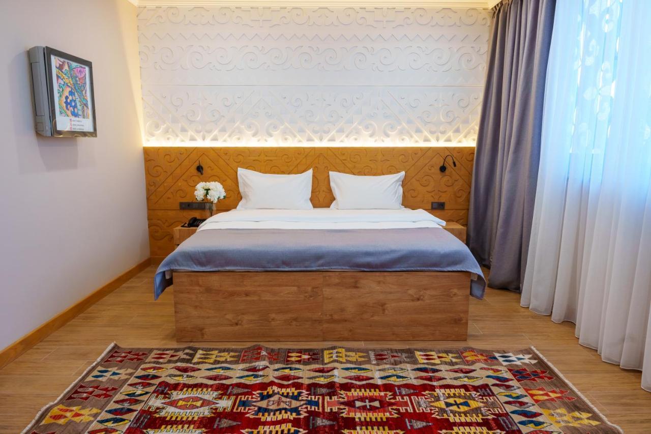 Dami Almaty Hotel Eksteriør bilde